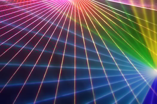 Colorful anniversary laser show with some smoke in the air. Party background photo