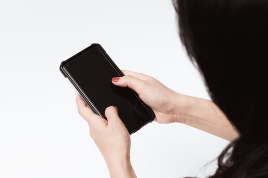 Asian women holding a mobile smartphone. photo