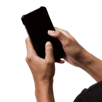 Asian person holding a mobile smartphone. photo