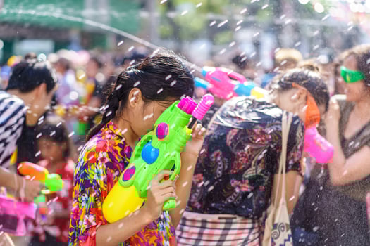 Siam Square, Bangkok, Thailand - APR 13, 2019 short action of people joins celebrations of the Thai New Year or Songkran in Siam Square. photo