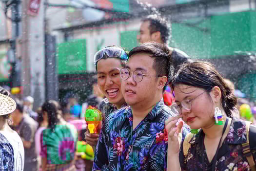 Siam Square, Bangkok, Thailand - APR 13, 2019 short action of people joins celebrations of the Thai New Year or Songkran in Siam Square. photo