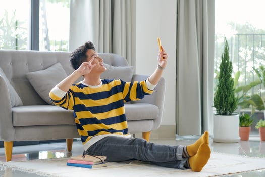 The guy takes a selfie, speaks via video photo