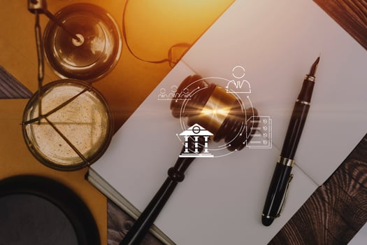 Business and lawyers discussing contract papers with brass scale on desk in office. Law, legal services, advice, justice and law concept picture with film grain effect photo