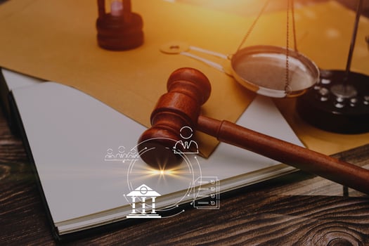 Business and lawyers discussing contract papers with brass scale on desk in office. Law, legal services, advice, justice and law concept picture with film grain effect photo
