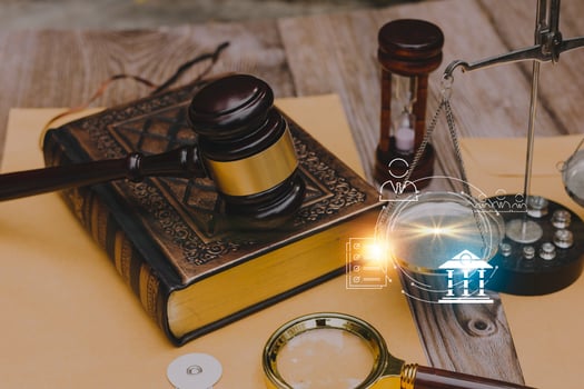 Business and lawyers discussing contract papers with brass scale on desk in office. Law, legal services, advice, justice and law concept picture with film grain effect photo