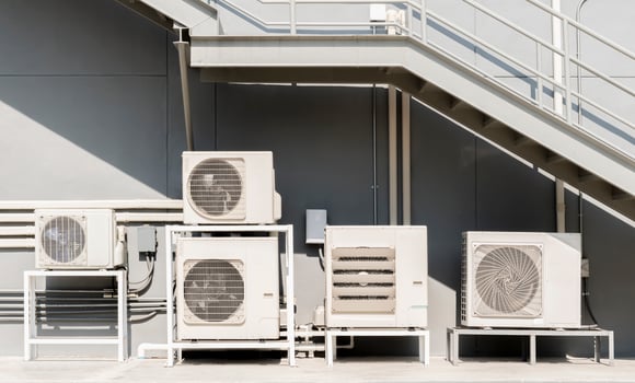 Compressors air conditioners on rooftop building photo