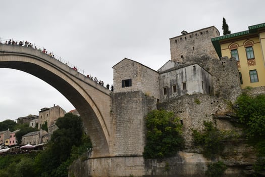 Pedestrian arch bridge over the Neretva River in Mostar, Bosnia and Herzegovina. photo