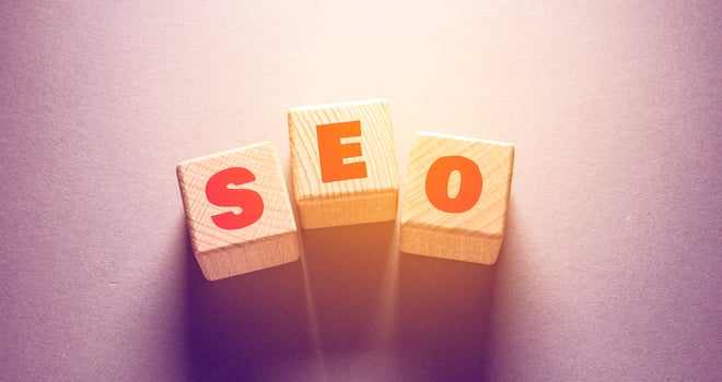 S E O Word with Wooden Cubes photo
