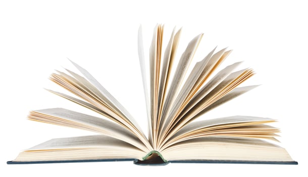 open book isolated on white background photo