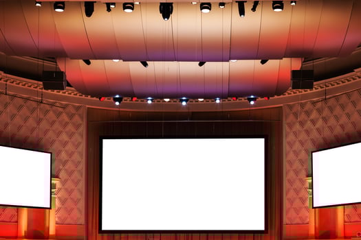 screens in red and brown illuminated cinema photo