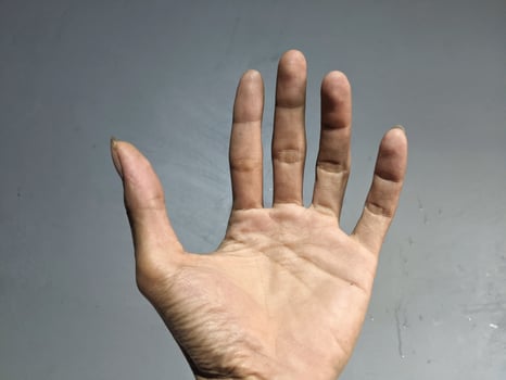signaling with fingers or symbols photo