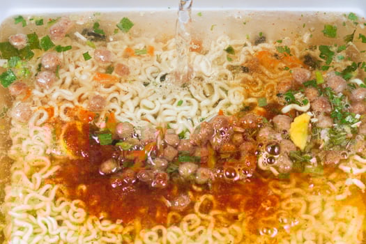 cooking of instant noodles photo