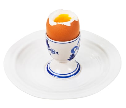 soft boiled egg in egg cup photo