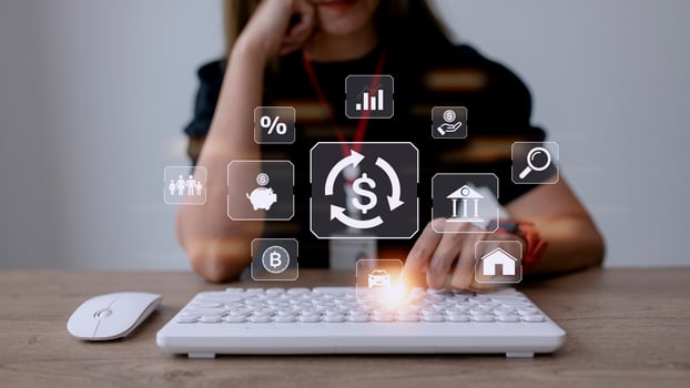 Working woman using a computer to Concept of fund financial investment management portfolio diversification photo