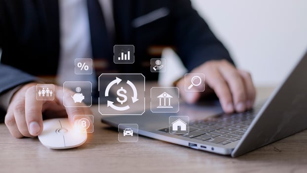 Businessman using a computer to Concept of fund financial investment management portfolio diversification photo
