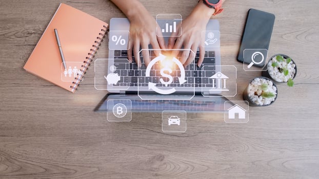 Working woman using a computer to Concept of fund financial investment management portfolio diversification photo
