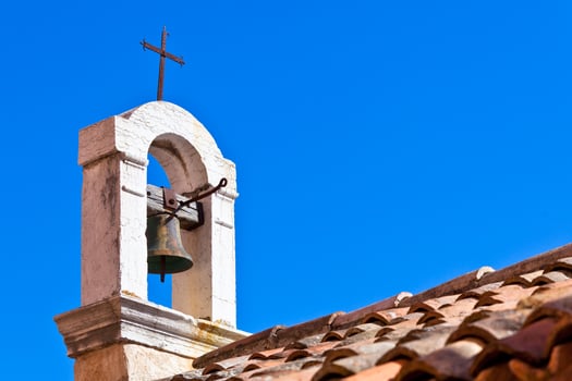 Croatian Church Roof on Blue Sky Background photo