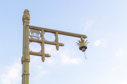 The lamp on the pole With a blue sky background photo