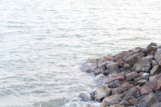 Reef in sea rocks with wind blows be sea waves photo