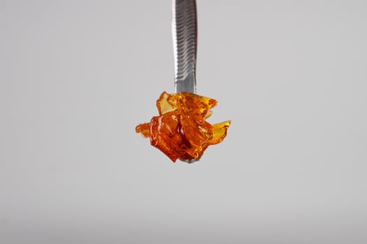 marijuana wax smear, cannabis dab with stick photo