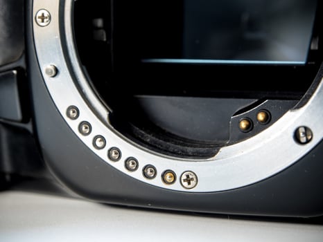 SLR camera body metal bayonet lens mount without lens photo