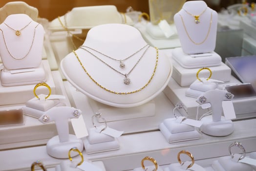 jewelry diamond shop with rings and necklaces luxury retail store window display photo