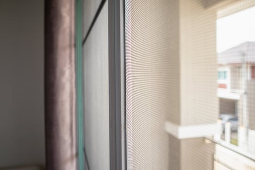 mosquito net wire screen on house window protection against insect photo