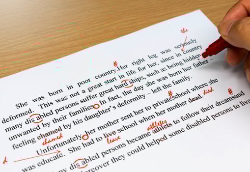 proofreading sheet on table photo