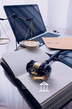 justice and law concept.Male judge in a courtroom on wooden table and Counselor or Male lawyer working in office. Legal law, advice and justice concept. photo