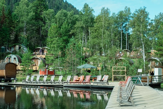 Russia, Vydrino village, Warm Lakes, September 12, 2022, Bilbo Tourist village, small guest houses photo