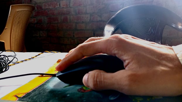 mouse in hand background photo