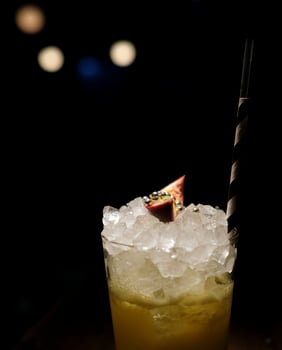 Beautiful cocktail in a glass with a blurred background photo