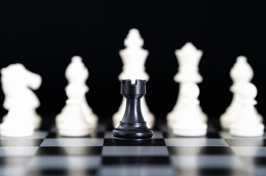 Chess pieces on chessboard photo