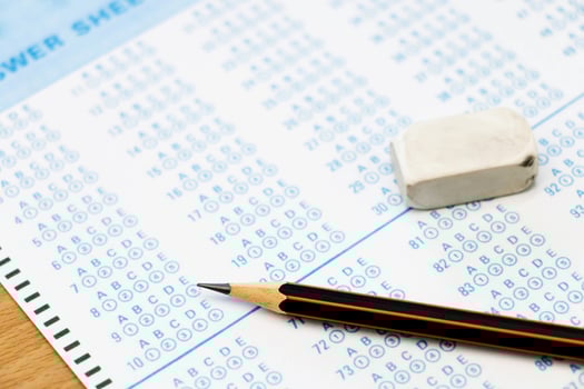 answer sheet with pencil photo