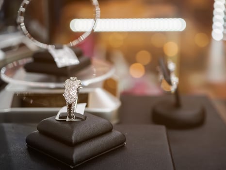 Diamond rings in jewelry luxury store window display photo