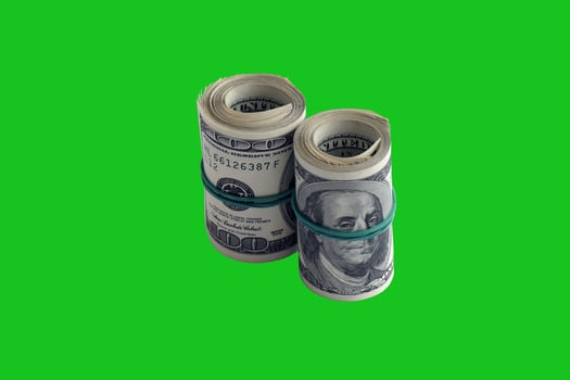 Bundle of US dollar bills isolated on chroma keyer green. Pack of american money with high resolution on perfect green mask photo