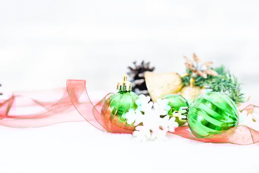 Christmas of  winter - Christmas balls with ribbon on snow, Winter holidays concept. Christmas green balls, golden balls, pine And Snowflakes decorations In Snow Background photo