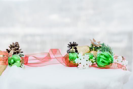 Christmas of  winter - Christmas balls with ribbon on snow, Winter holidays concept. Christmas green balls, golden balls, pine And Snowflakes decorations In Snow Background photo