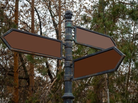 Signs in the park. Empty signs in the autumn park. photo