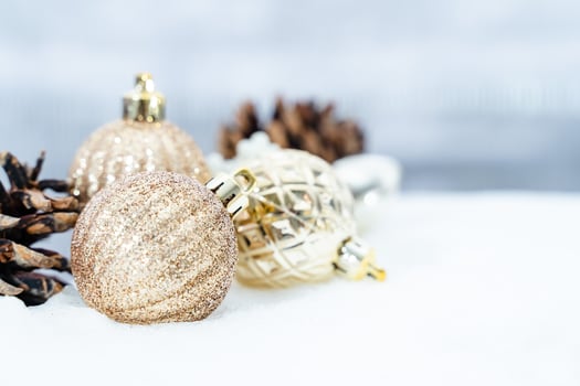 Christmas of  winter - Christmas balls with ribbon on snow, Winter holidays concept. Christmas red balls, golden balls, pine And Snowflakes decorations In Snow Background photo