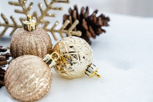 Christmas of  winter - Christmas balls with ribbon on snow, Winter holidays concept. Christmas red balls, golden balls, pine And Snowflakes decorations In Snow Background photo