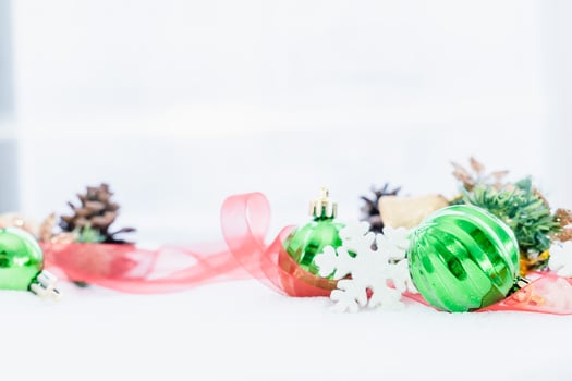 Christmas of  winter - Christmas balls with ribbon on snow, Winter holidays concept. Christmas red balls, golden balls, pine And Snowflakes decorations In Snow Background photo