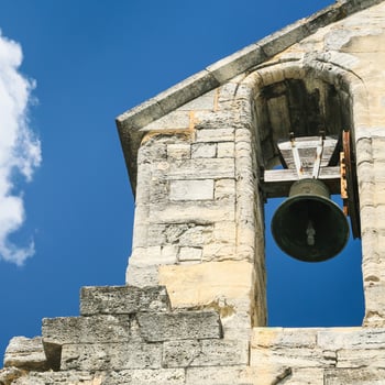 bell in bell tower of cathedral in Avignon photo