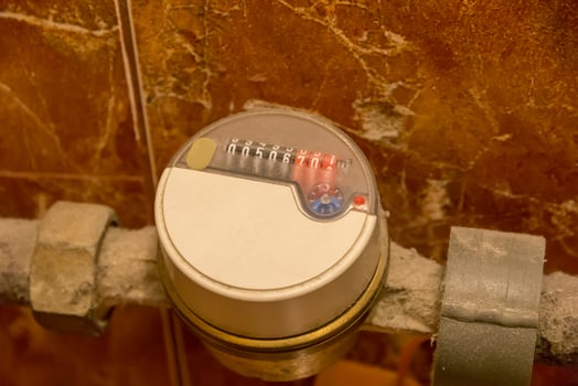 Water meters installed on old pipes. Selective focus. Concept. repair, water supply, water metering, maintenance photo
