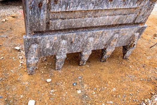 Industrial background. Digger bucket close-up. Construction excavator bucket. photo