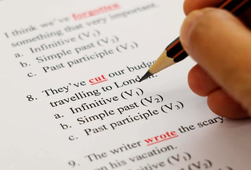 english exam on table with pencil photo