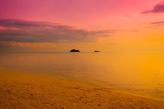 Beautiful sunset over the sea for travel and vacation photo