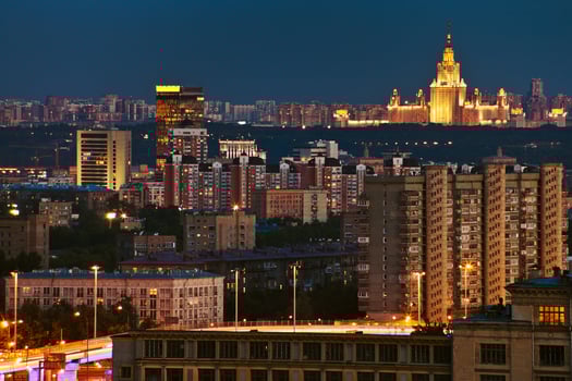 illuminated city in summer night photo