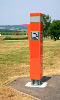 orange light reflecting traffic box SOS photo