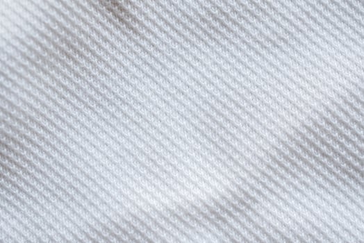 White fabric sport clothing jersey texture background photo